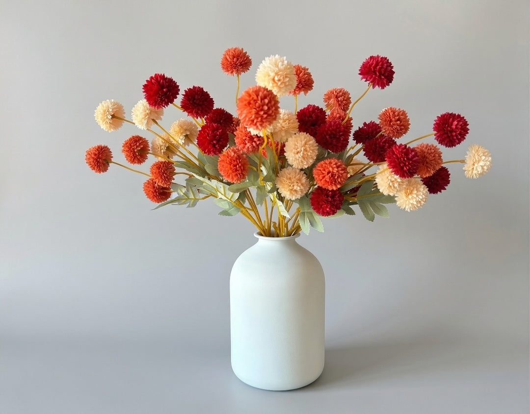 Fall silk faux chrysanthemum stems in burgundy, peach, and terracotta