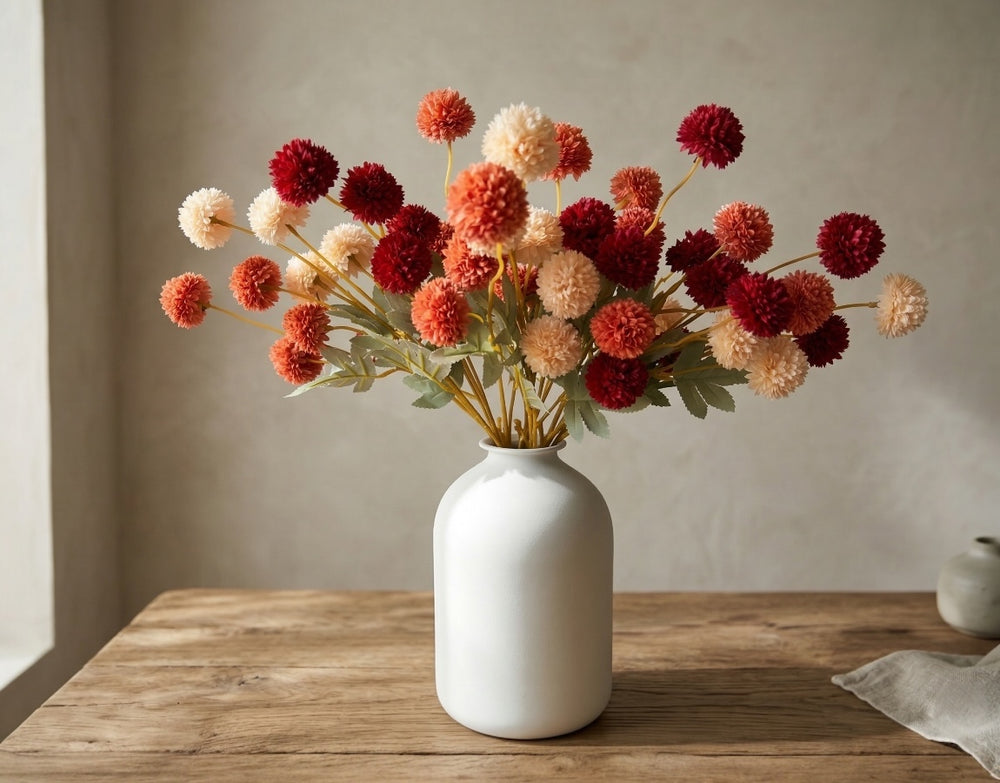 Faux kiku flowers in warm autumn tones for seasonal floral decor